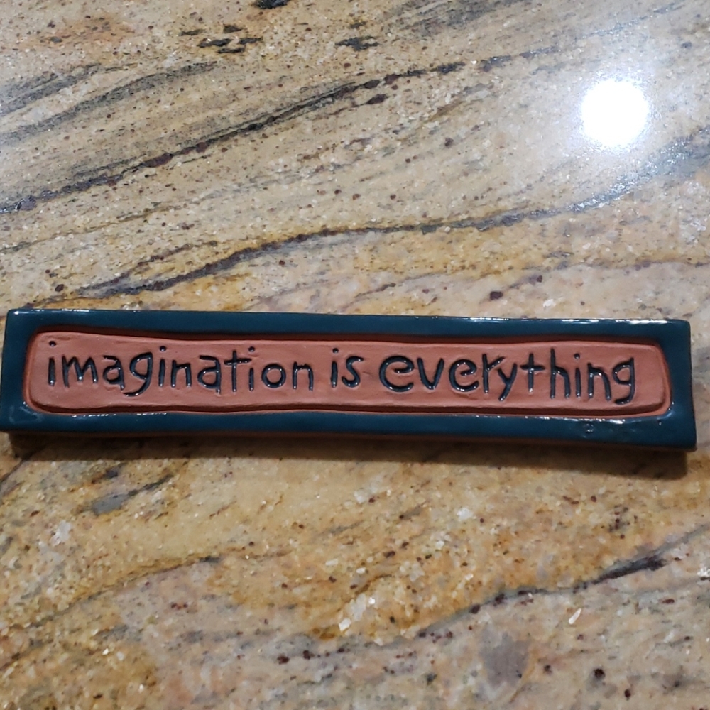 Ceramic wall hanging "imagination is everything"
